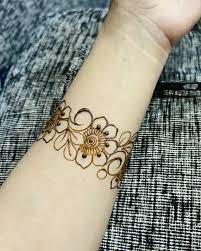 mid hand henna (two sides)