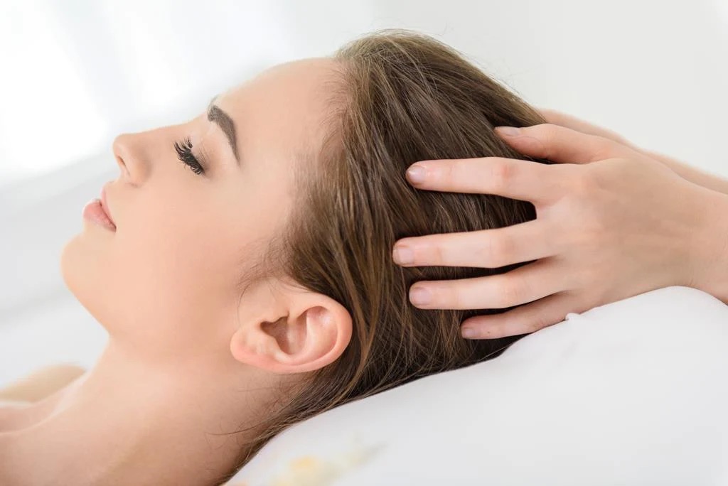 Head massage with natural oils